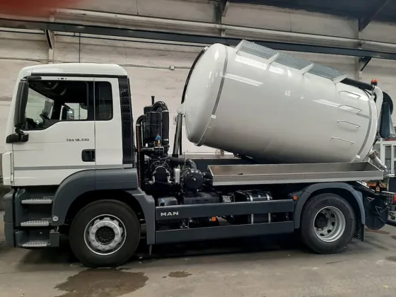 Tanker truck loading sludge from an industrial WWTP